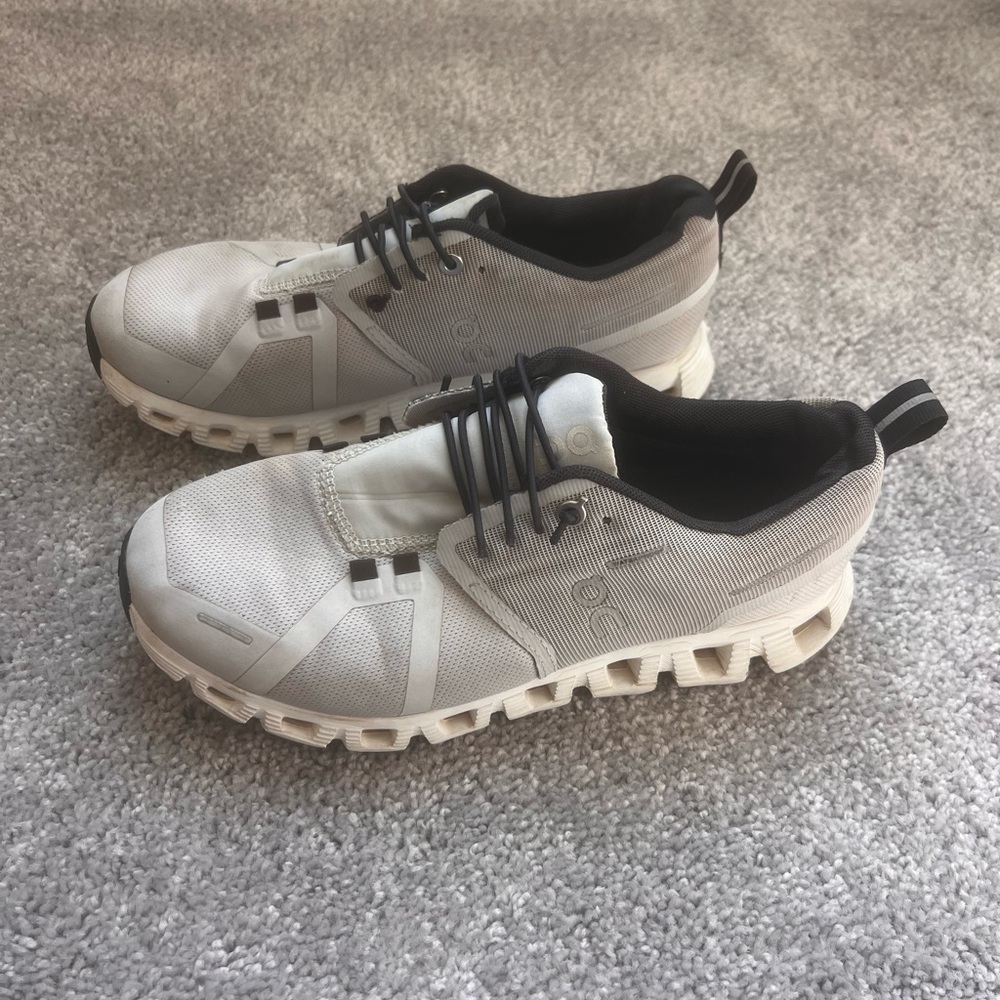 On Running Black and White Sneakers